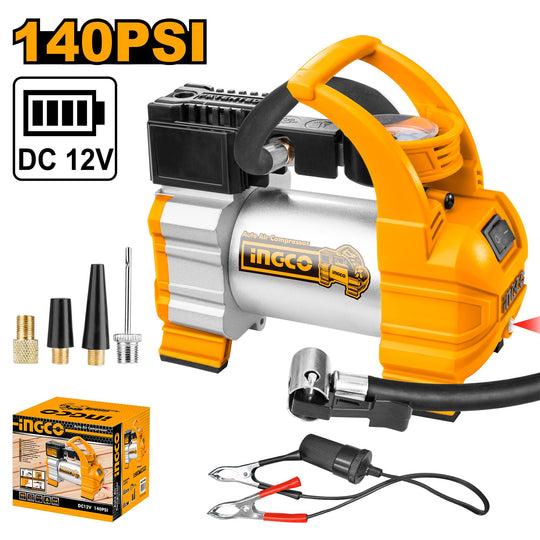 Orange and silver air compressor with accessories on a white background