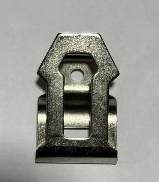 Metallic clip on a gray background